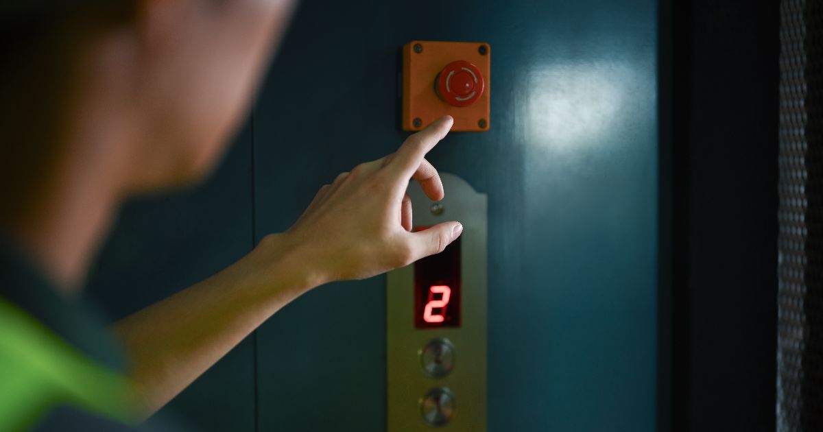 how does the elevator emergency button work